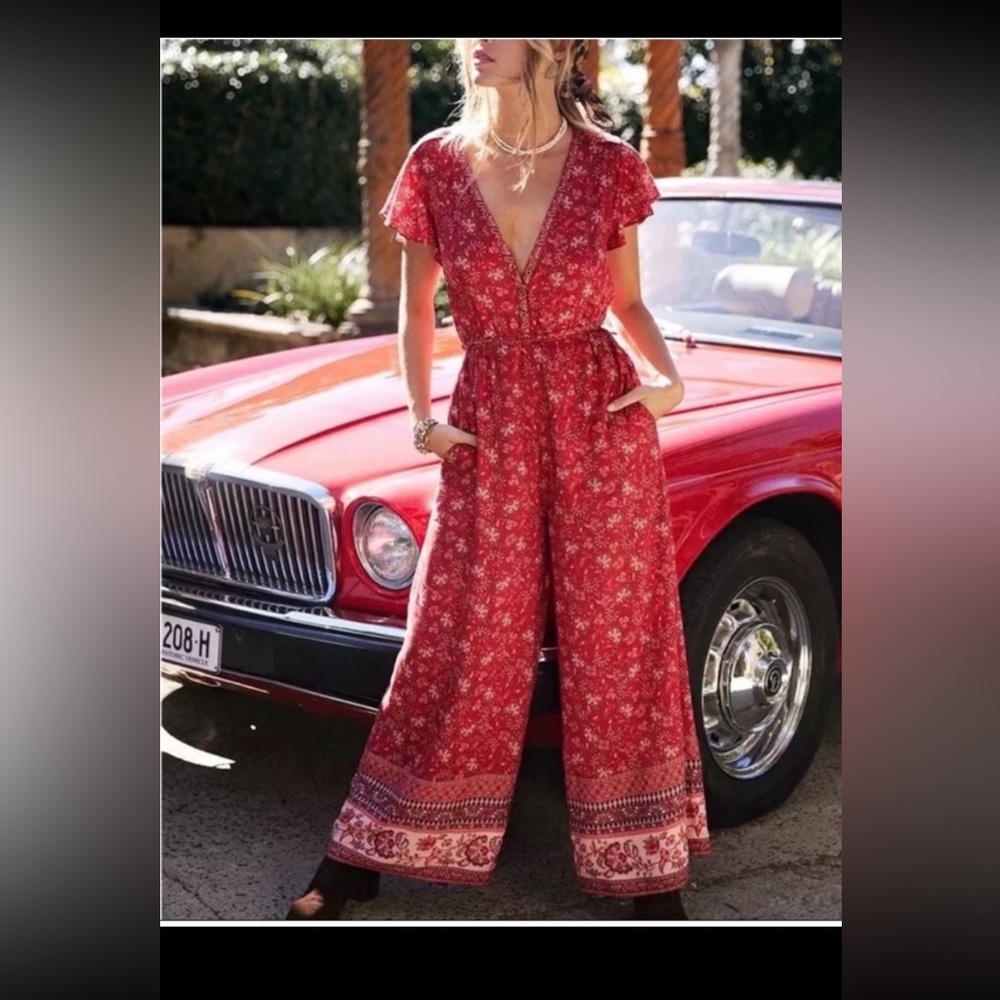 NWOT BOUTIQUE Floral Red Jumpsuit size M